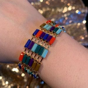 Golden bracelet with beautiful vibrant colors.